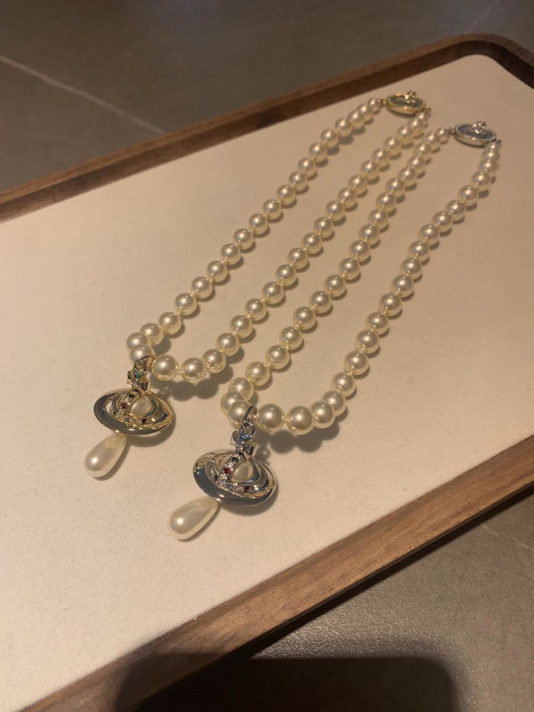 Vivienne Westwood Elegant Pearl Necklace with Pendant